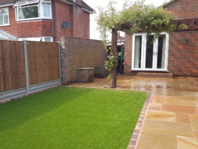 a picture of garden landscaping with sandstone walk way