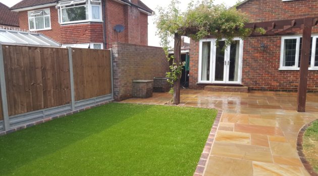 a picture of garden landscaping with sandstone walk way